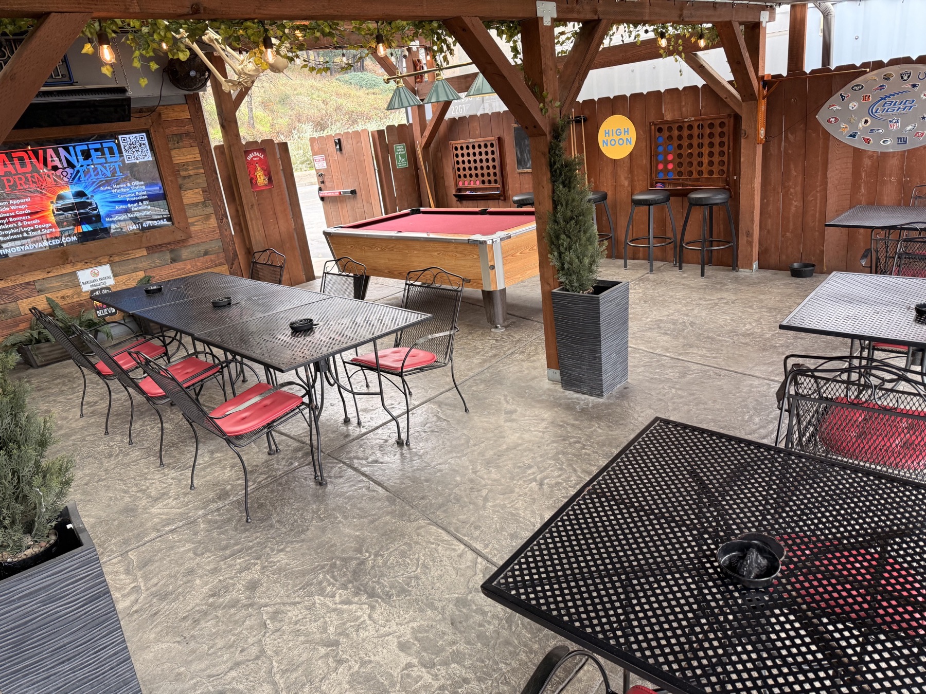 Flespy’s patio with pool table and giant Connect Four