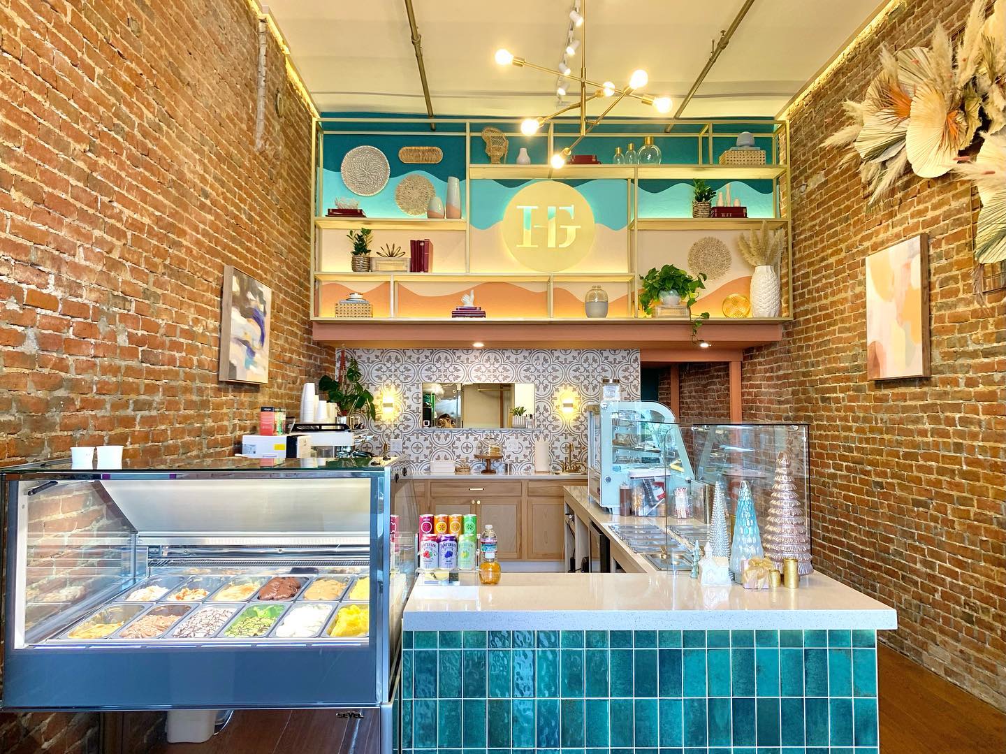 The warm brick and teal interior of House of Glory