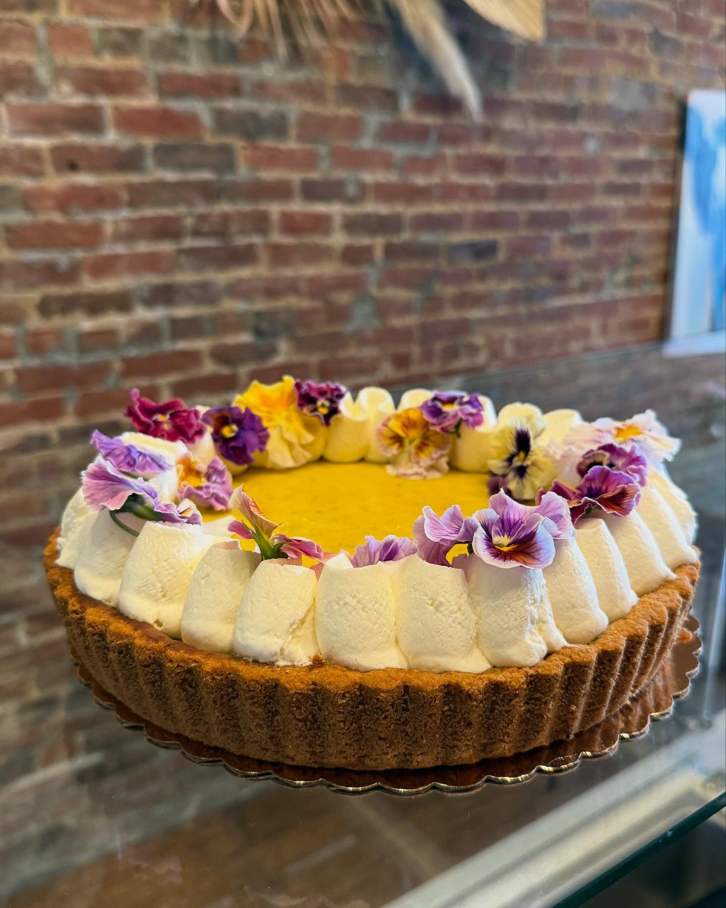 Floral-topped handcrafted dessert