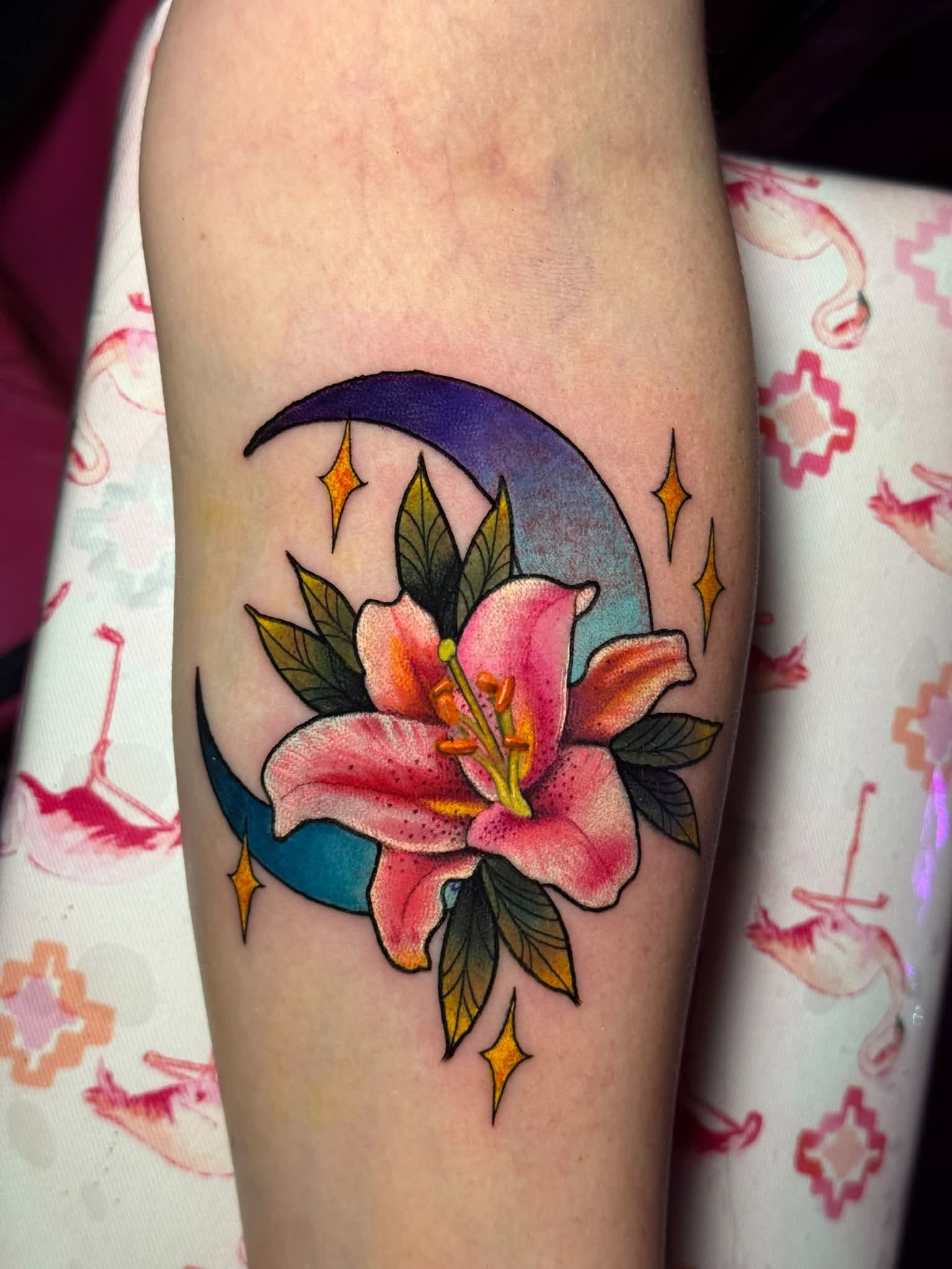 Pink flower and blue moon tattoo